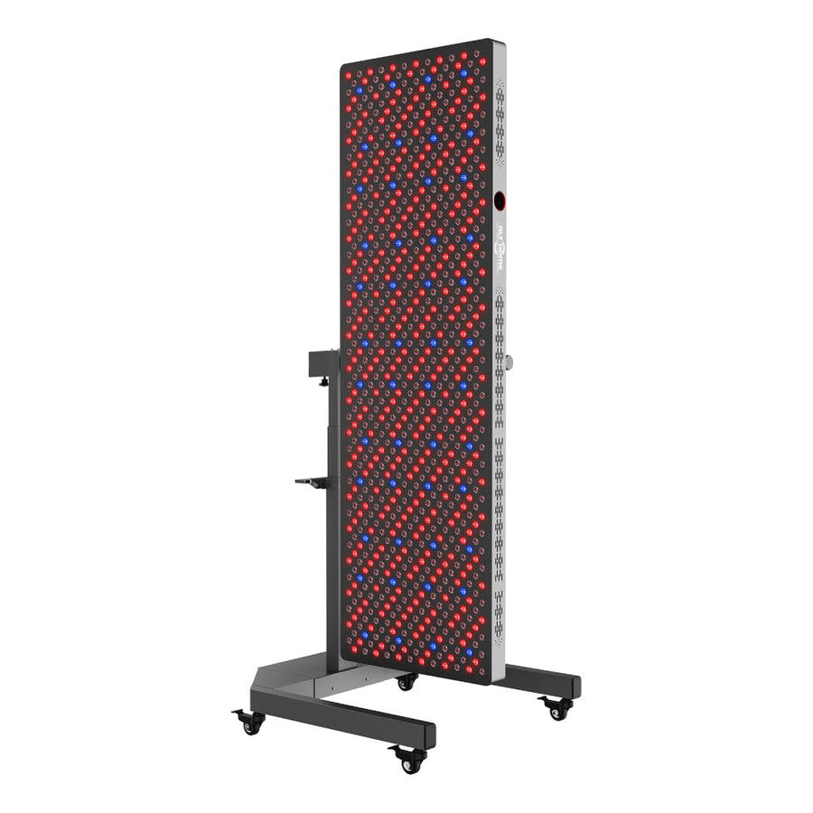 RLT Home Total Spectrum ELITE red light therapy panel, vertical with LEDs on, on its electric stand